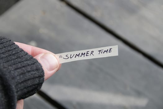 It's summer time concept. The inscription on the tag.