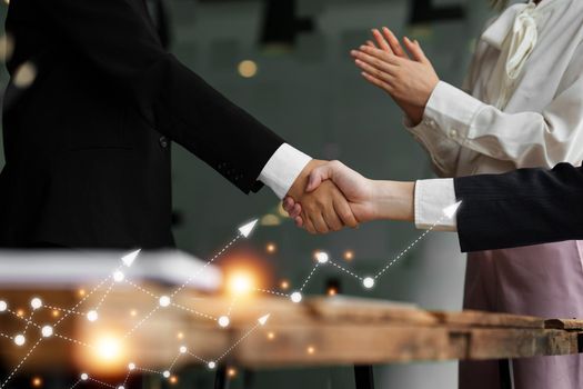 Business partnership meeting concept. Image businessmans handshake. Successful businessmen handshaking after good deal. Group support concept