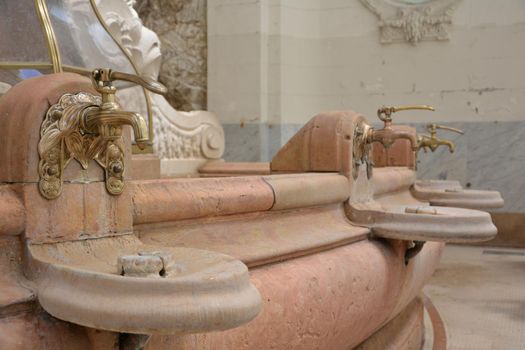 Vintage faucet with a source of mineral water in Vichy,France.