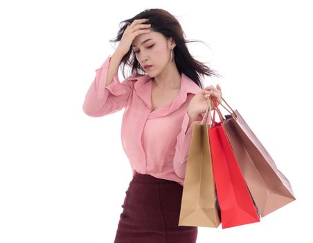 stressed woman holding shopping bag isolated on a white background