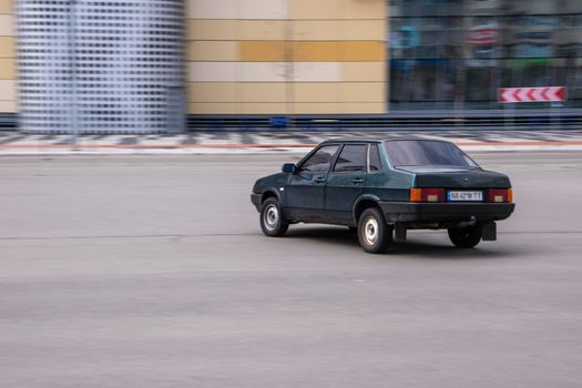 Ukraine, Kyiv - 26 April 2021: Green LADA 21099 car moving on the street. Editorial