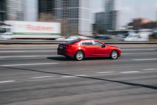 Ukraine, Kyiv - 29 April 2021: Red MAZDA 6 car moving on the street. Editorial
