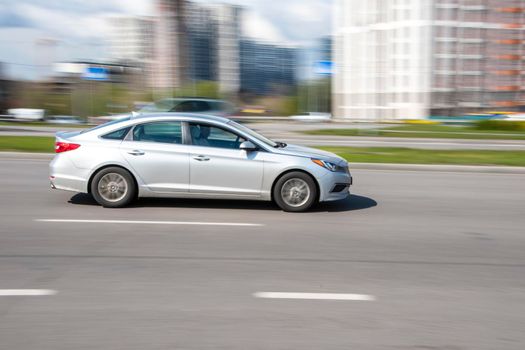 Ukraine, Kyiv - 26 April 2021: Silver Hyundai Sonata car moving on the street. Editorial