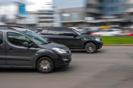 Ukraine, Kyiv - 26 April 2021: Black BMW X5 car moving on the street. Editorial