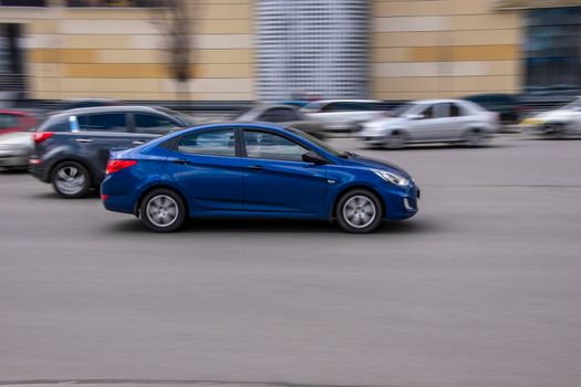 Ukraine, Kyiv - 26 April 2021: Blue Hyundai Accent car moving on the street. Editorial