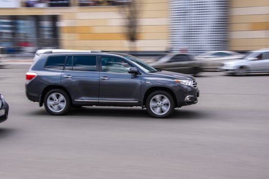 Ukraine, Kyiv - 26 April 2021: Gray Toyota Highlander car moving on the street. Editorial