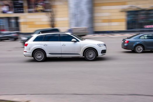 Ukraine, Kyiv - 26 April 2021: White Audi Q7 car moving on the street. Editorial