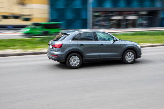 Ukraine, Kyiv - 26 April 2021: Gray Audi Q3 car moving on the street. Editorial
