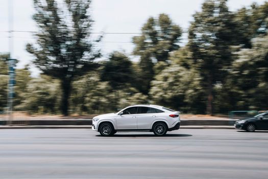 Ukraine, Kyiv - 27 June 2021: White Hyundai Elantra car moving on the street. Editorial