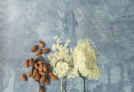 almonds, flakes and flour made from it. top view. High quality photo