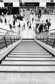 Nice, France - May 5, 2015: people walking inside the Nice airport to take flight, picture taken before a start towards a holiday ---- people walking inside the airport to leave for a trip