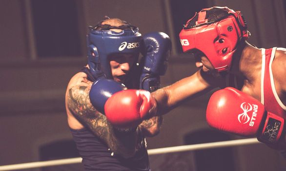 Imperia, Italy, 07/07/2019: Amateur boxing fight in action in the ring, sport  reportage