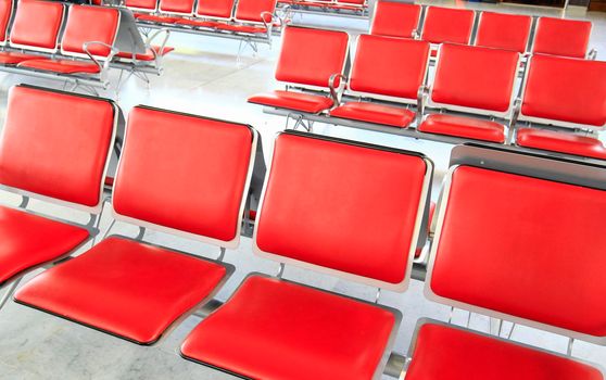 an airport waiting room chairs.