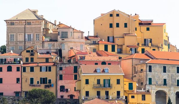 Front view of ancient Ligurian houses in the city of Imperia in Porto Maurizio.