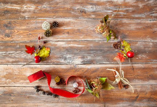 background with autumn leaves  laid on wooden table