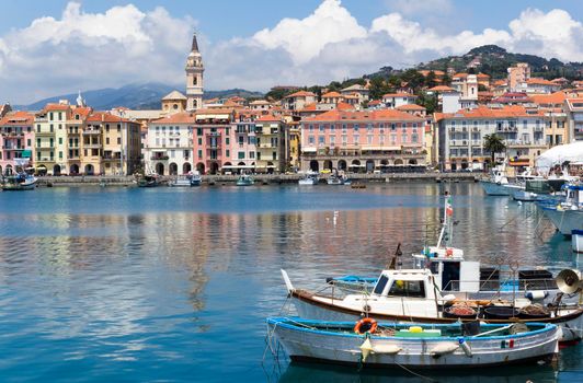 Italy, Liguria, ancient port of the province of Imperia Oneglia with fishing boats and colorful houses