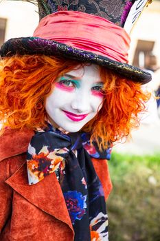 Lucca, Italy, 03/11/2018: During the carnival days a cosplayer dressed as a Mad hatter, Character of the famous movie of Alice in Wonderland