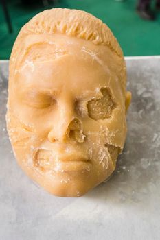 Bologna, BO, Italy - April 3, 2016: During a trade fair for medical products is used a fake rubber face to simulate facial reconstruction operations. ---- Face used to simulate facial reconstructions.