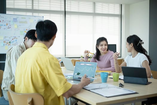 Shot of startup business team brainstorming and planning new project together in modern office.