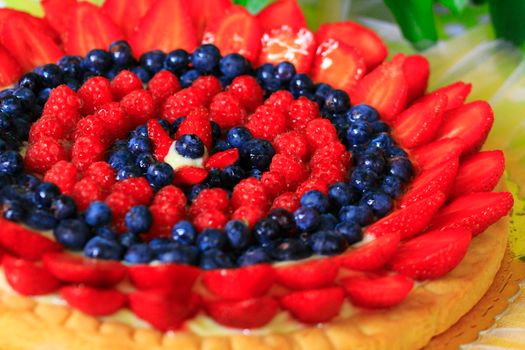 Fruit cake with strawberries and blueberries