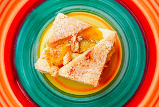 Fruit cake on a beautiful colored plate