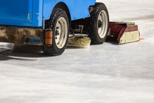 machine leveling the ice on the skating rink