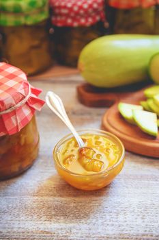 Zucchini jam in a jar. Selective focus. Food.