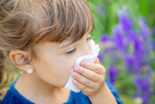 Seasonal allergy in a child. Coryza. Selective focus.