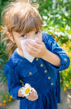 Seasonal allergy in a child. Coryza. Selective focus.