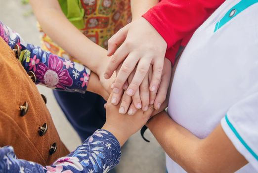 hands of children, many friends, games. Selective focus summer