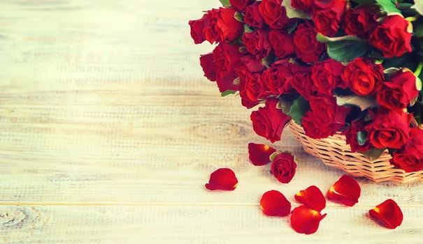 Bouquet of red roses, a gift for Valentine's Day. Selective focus. Holiday.