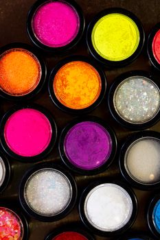 multicolor glitter used for mails art and photographed from above
