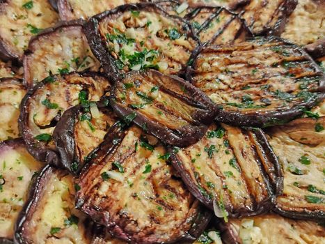 grilled eggplant seasoned with oil and parsley, vegetarian cuisine