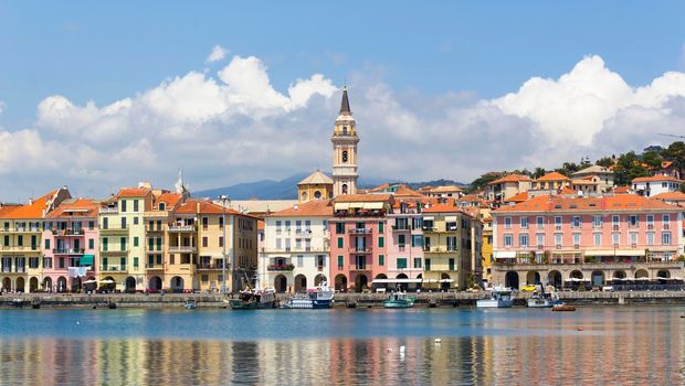 Italy, Liguria, ancient port of the province of Imperia Oneglia with fishing boats and colorful houses