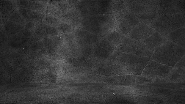 Old black background. Grunge texture. Dark wallpaper. Blackboard Chalkboard Concrete.