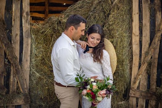 young couple in wedding dresses. rustic wedding