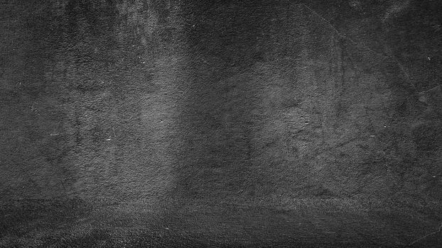 Old black background. Grunge texture. Dark wallpaper. Blackboard Chalkboard Concrete.