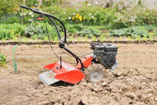 A plow plows the ground