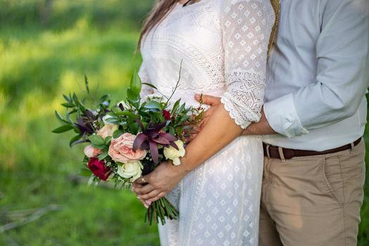 wedding bouquet in bride's hands, david austin.