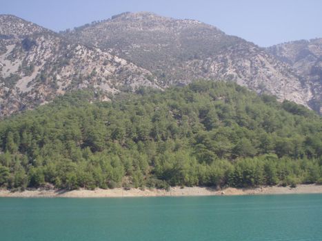 The panoramic view of mountain lake and mountains.