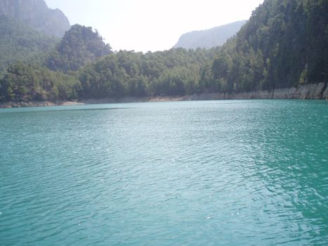 The panoramic view of mountain lake and mountains.