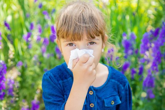 Seasonal allergy in a child. Coryza. Selective focus.