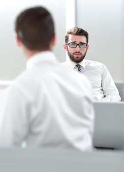 business background.business colleagues sitting in the office lobby .photo with copy space