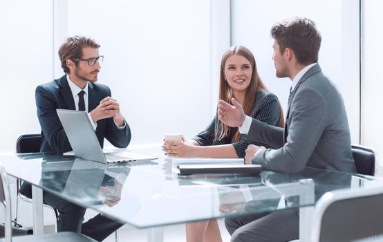 business partners discussing a new joint project at a business meeting