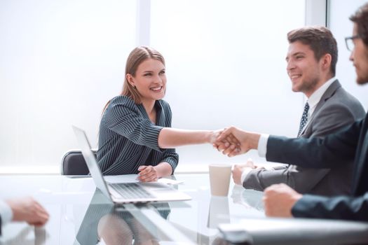 Business people shaking hands in the boardroom. concept of partnership