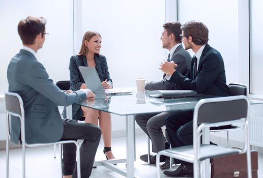 business team discussing ideas for a new project at a meeting in the office.