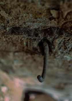 Antique metal hook in wall