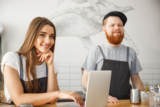 Coffee Business Concept - Portrait of small business partners working together at their coffee shop