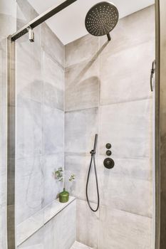 Modern shower stall in a bright bathroom