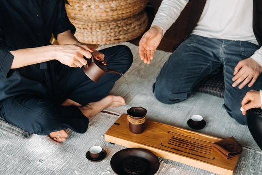 Preparing for a tea ceremony with a large company.